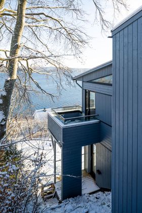 Bilde av fasade med en liten veranda 
